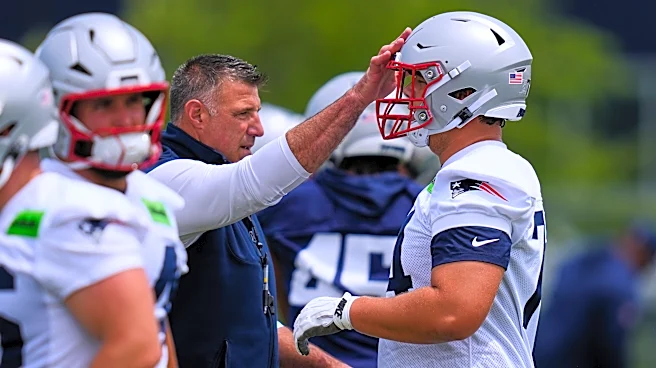 Patriots coach Mike Vrabel focused on spring workouts after missing final day of draft last month