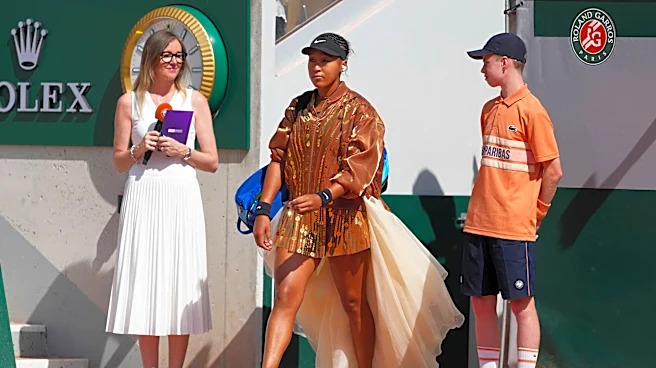 Naomi Osaka's latest French Open fashion ensemble includes ivory train and gold jacket