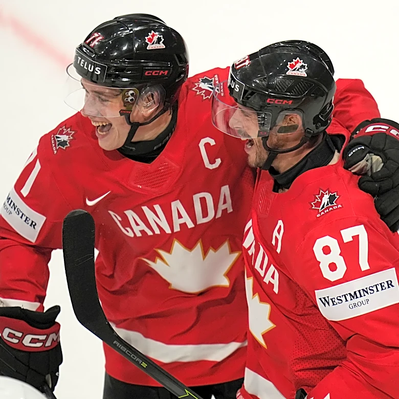 Celebrini and Crosby score as Canada beats US to advance to semifinals of ice hockey worlds