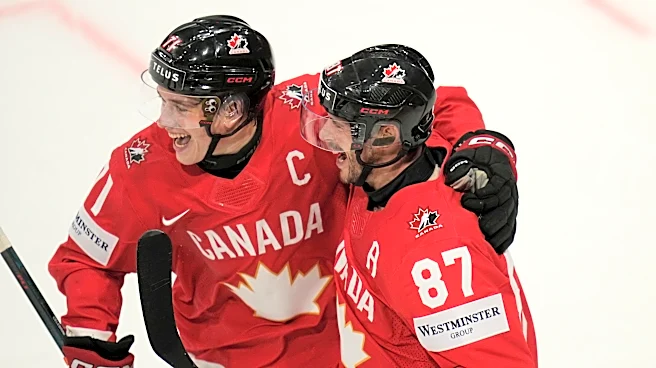 Celebrini and Crosby score as Canada beats US to advance to semifinals of ice hockey worlds