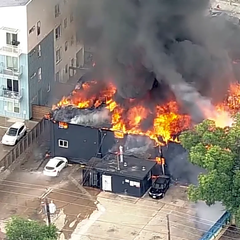 A large fire has erupted at an apartment complex in Dallas