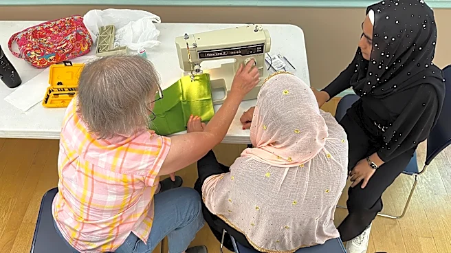 After refugee aid cuts, faith groups help Afghan women connect through sewing
