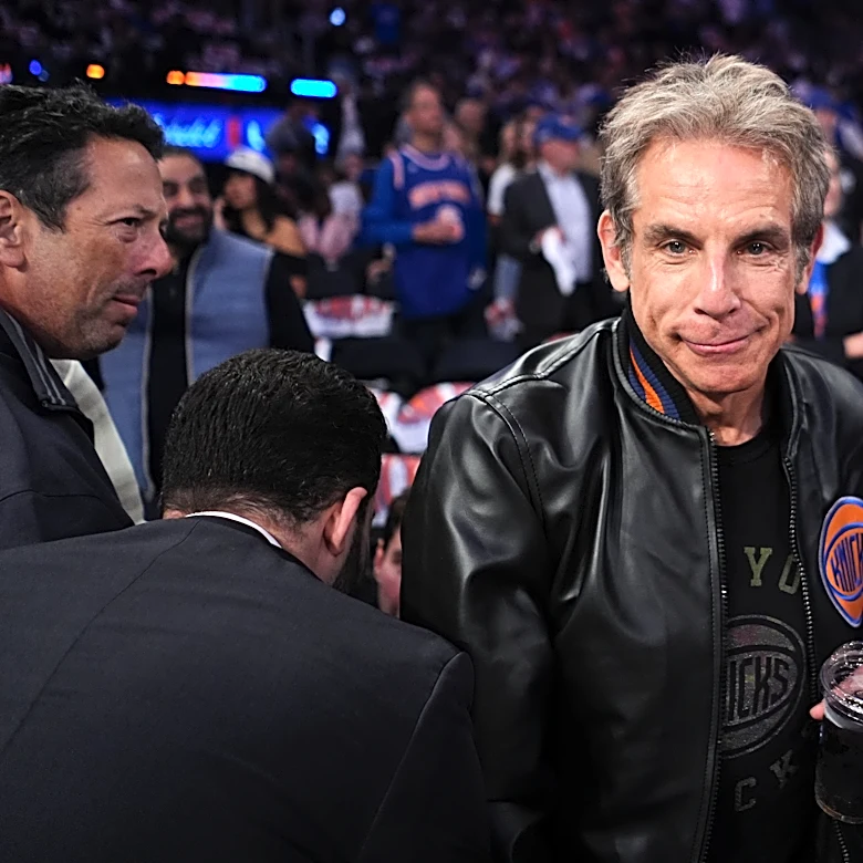 Ben Stiller welcomes a photo with Mike Brown's wife, after Knicks coach said she was afraid to ask