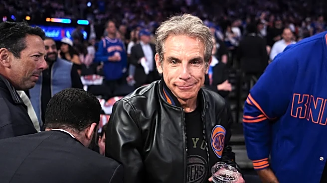 Ben Stiller welcomes a photo with Mike Brown's wife, after Knicks coach said she was afraid to ask