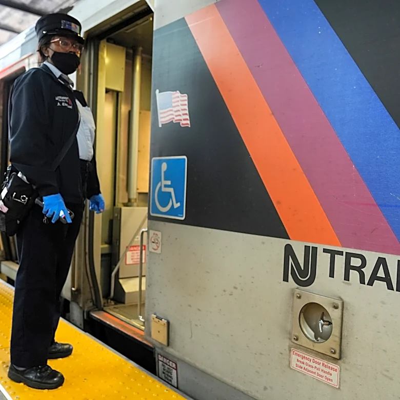 Rail car fire near New York's Penn Station injures 5, snarls morning commute, train service delayed