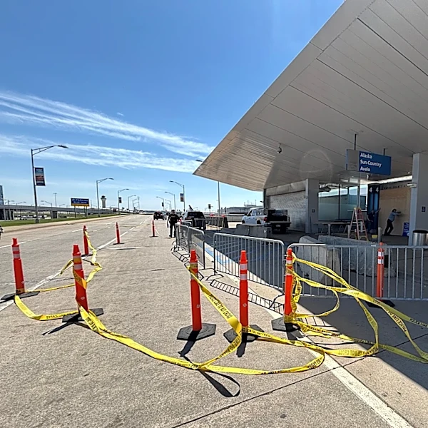 Car crashes into a passenger terminal at Detroit Metropolitan Airport, driver arrested