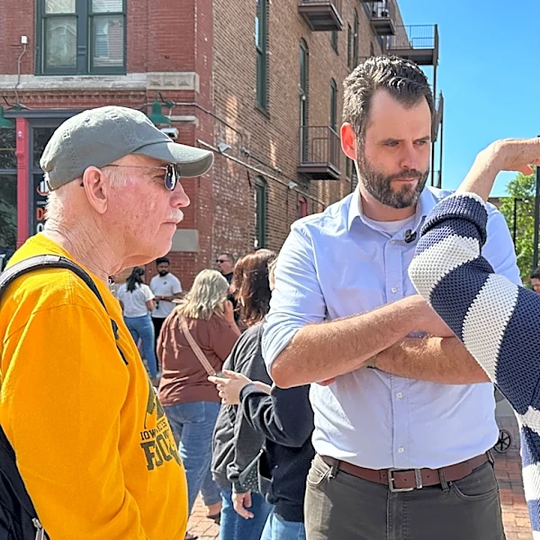 Iowa Democrats hoping to flip a US Senate seat are torn over which of 2 hopefuls has the best shot
