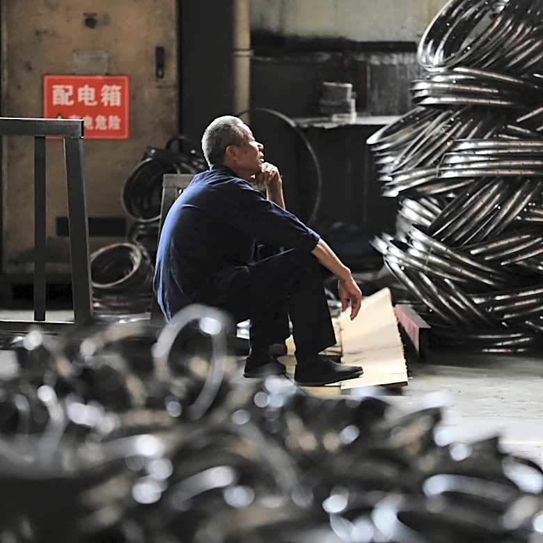 China’s factory activity slows in May, raising questions over its economy