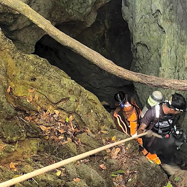 Heavy rains threaten to delay search for 2 people missing in Laos cave