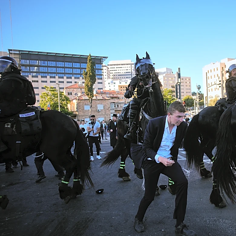 Ultra-Orthodox protesters block roads and trains across Israel over military draft