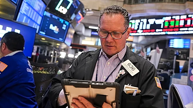 Oil prices rise, but Wall Street still hangs near its records