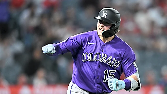 Goodman's 3-run homer and Rumfield's sac fly help Rockies rally for 9-8 win over Angels