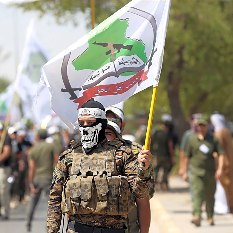 Powerful Iran-backed militias in Iraq say they will start handing in weapons to authorities