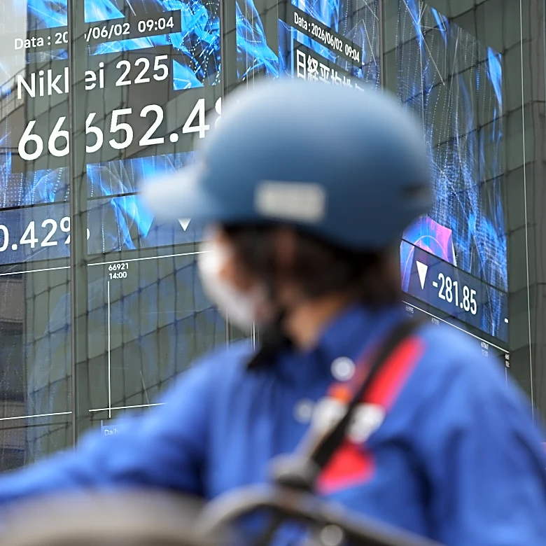 Tokyo's Nikkei 225 index tops 68,000 for the 1st time as Wall Street logs more records