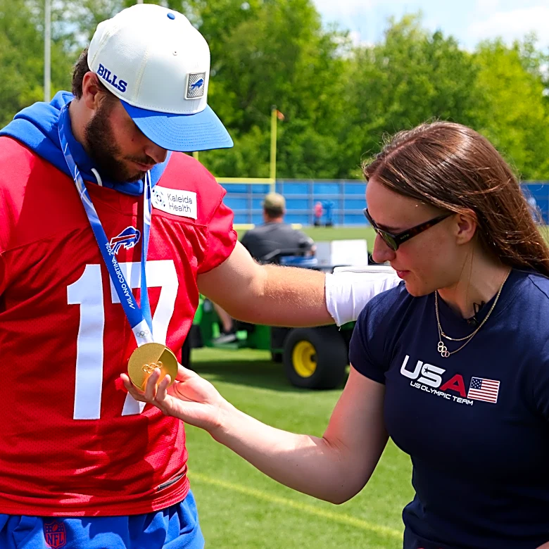 Hayley Scamurra gets a thrill showing off US hockey gold medal with Josh Allen at Bills practice