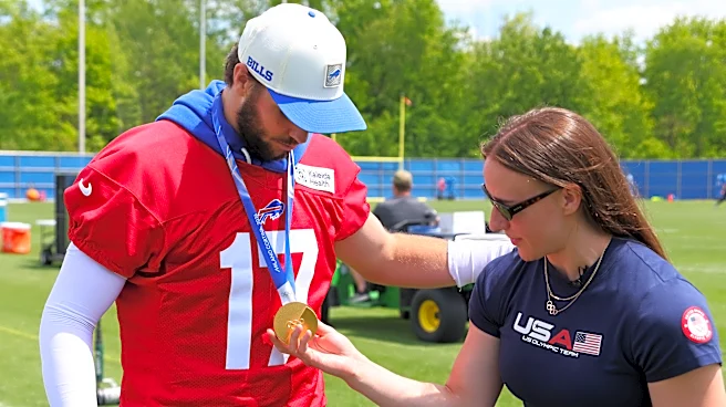 Hayley Scamurra gets a thrill showing off US hockey gold medal with Josh Allen at Bills practice