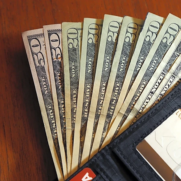 How can I illustrate our financial position to a spouse who shows little interest?