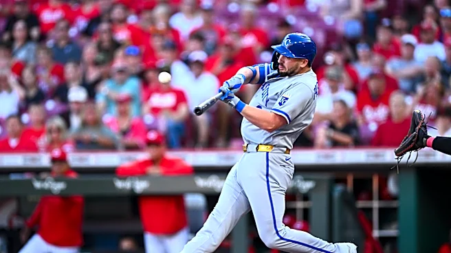 Massey hits tiebreaking RBI single in 9th inning, Royals beat Reds 5-2