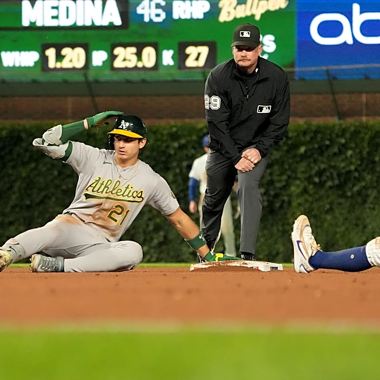 Kurtz drives in winning run in 10th as A's beat Cubs 5-4; Chicago's Happ reaches 1,000 career hits