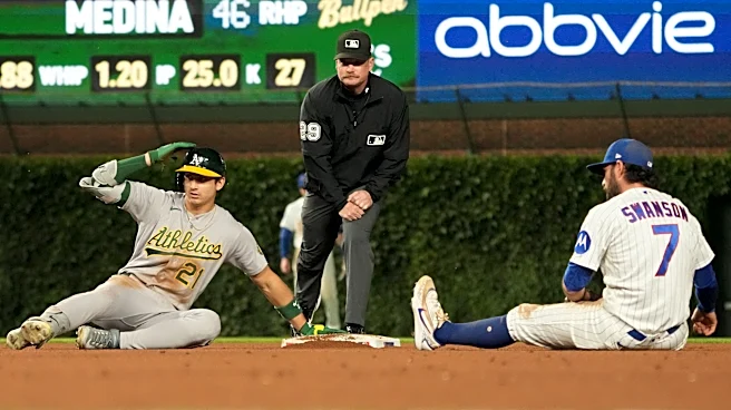 Kurtz drives in winning run in 10th as A's beat Cubs 5-4; Chicago's Happ reaches 1,000 career hits