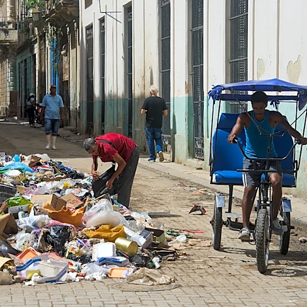 A garbage crisis engulfs Havana as fuel shortages stall trash pickup