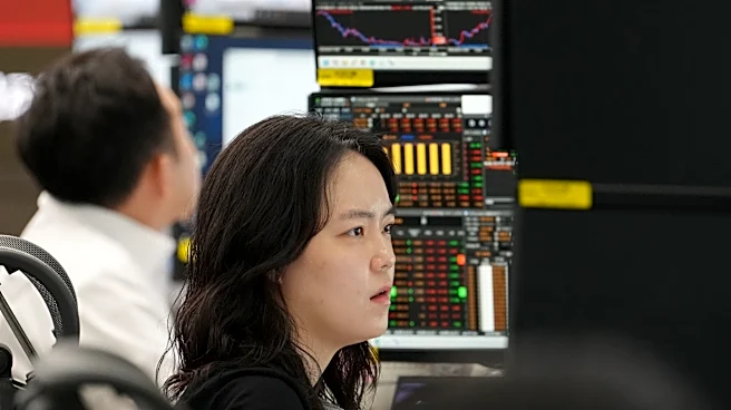 European shares climb and Asian shares retreat after US stocks pause their record-breaking rally