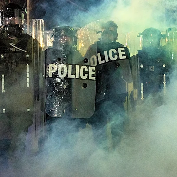 New Jersey police sergeant charged with stealing journalist's camera bag at immigration protest