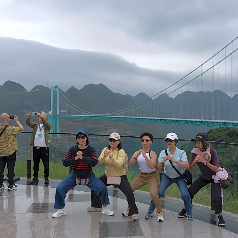 China’s highest bridge brings tourists and internet access to remote communities, in photos