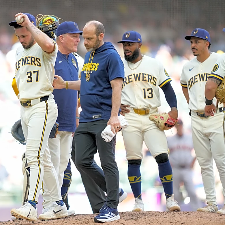 Brewers place DL Hall on injured list and designate Jake Woodford for assignment