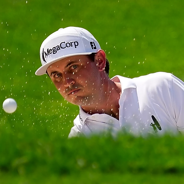 J.T. Poston handles the wind at Memorial for low round of tournament and the lead