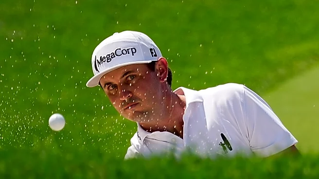 J.T. Poston handles the wind at Memorial for low round of tournament and the lead