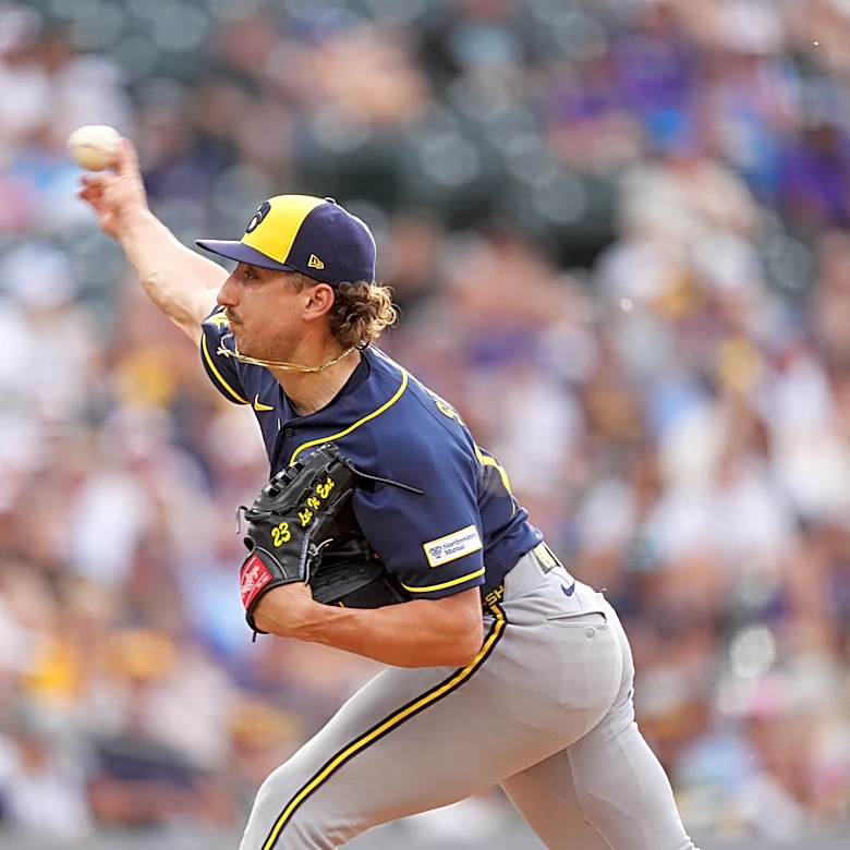 Brewers score 8 late runs, stun Rockies 9-7 in wild 10-inning victory