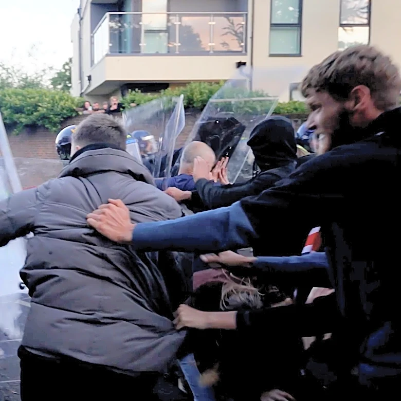 UK police charge 6 more with violent disorder at protest over teen's stabbing death