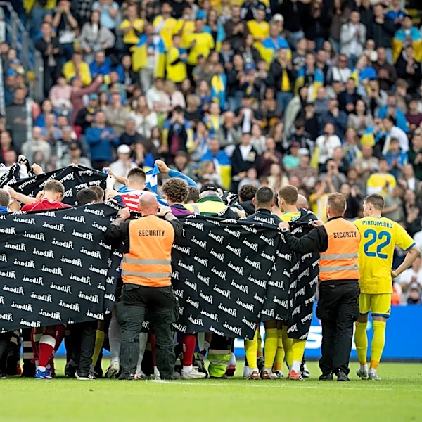 Denmark says soccer star Christian Eriksen 'conscious' after collapsing on field again in match