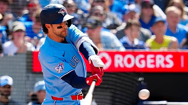 Toronto's Clement dodges tag from Baltimore's Henderson and is ruled safe, angering Orioles in loss
