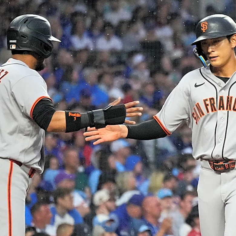 Chapman’s 10th-inning single gives the Giants a 2-1 win over the Cubs