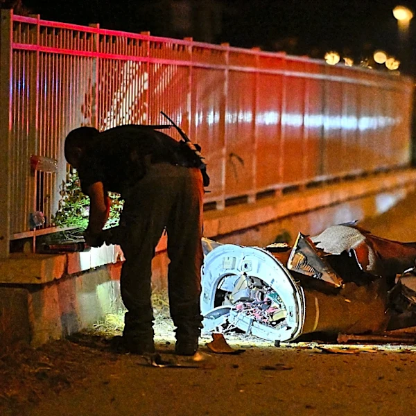 The Latest: Israel and Iran exchange fire as hostilities escalate