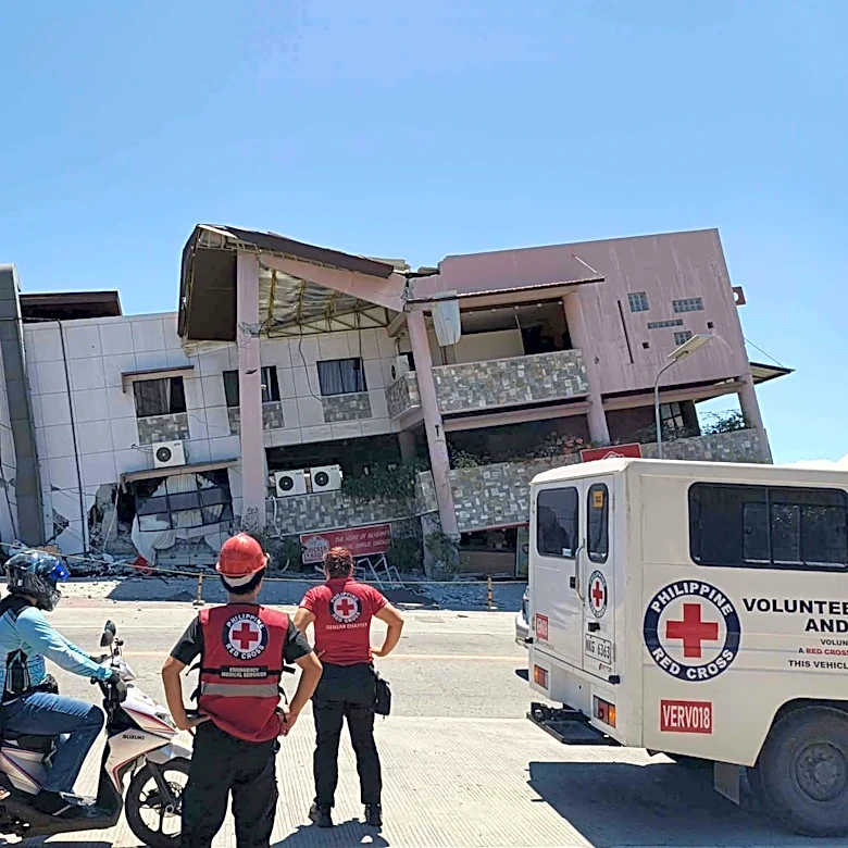 A 7.8 magnitude quake in the Philippines kills at least 16, fells buildings and sets off a tsunami