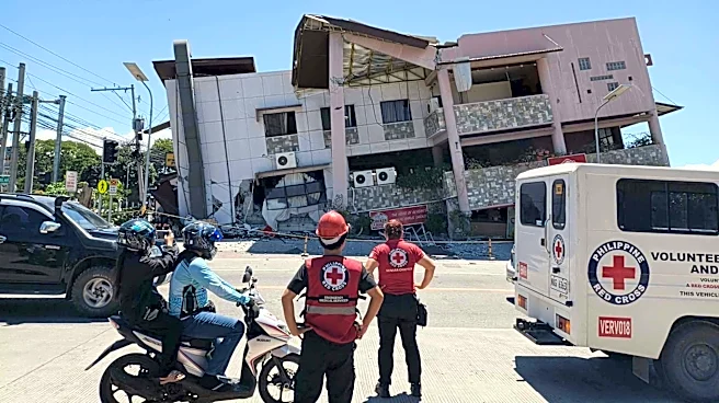 A 7.8 magnitude quake in the Philippines kills at least 19, fells buildings and sets off a tsunami