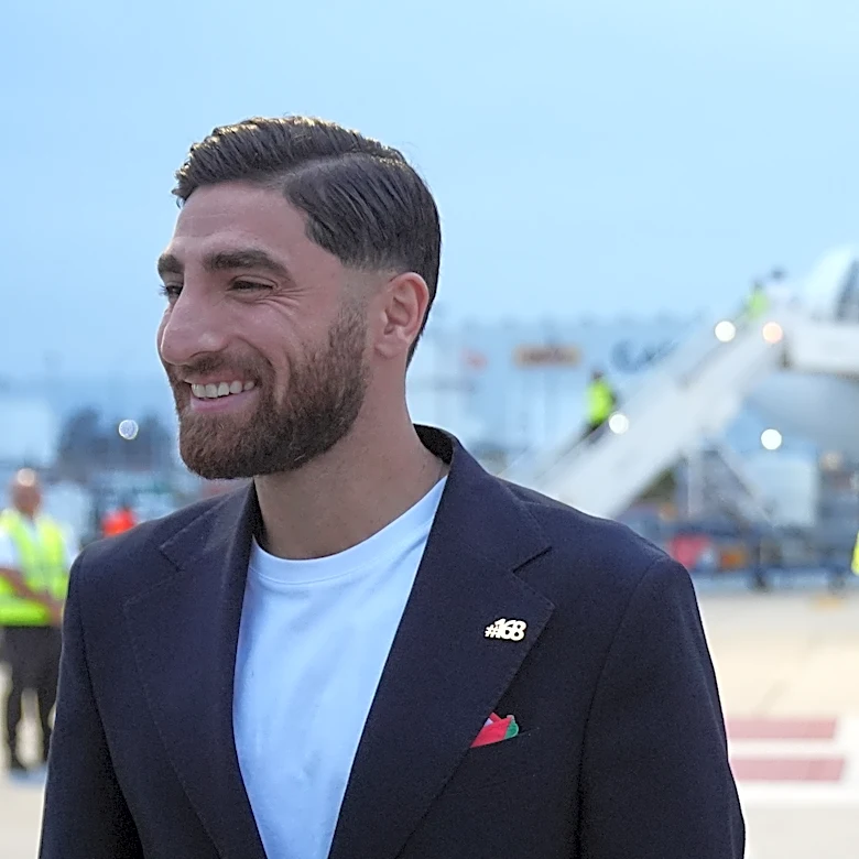 Iran's World Cup players wear pins for victims of deadly strike on school as they arrive in Mexico