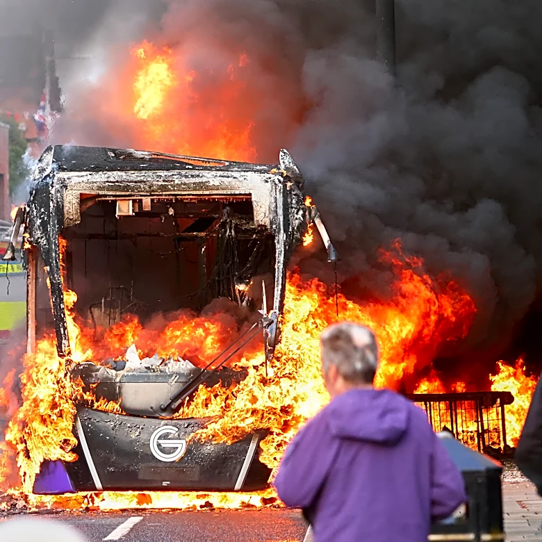 UK leaders call for calm as protests break out after Belfast street stabbing