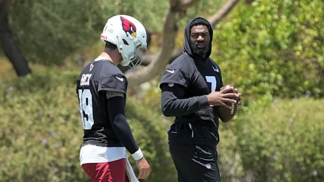 Quarterback Jacoby Brissett reports to Cardinals' mandatory camp, though future remains unclear