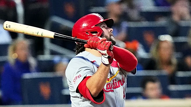 Burleson homers and drives in 3 to back May as Cardinals blank Mets 7-0 for 5th straight win