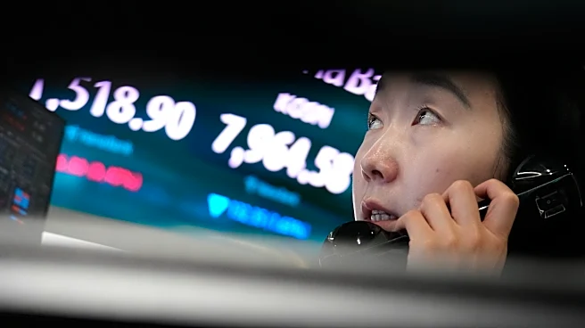 Asian shares fall after a tech sell-off on Wall Street, while oil prices gain