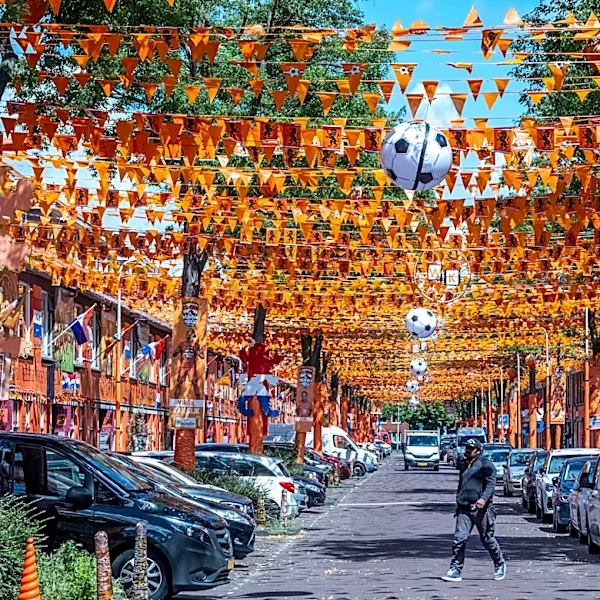A street in The Hague is drenched in orange as Netherlands soccer fans celebrate the World Cup