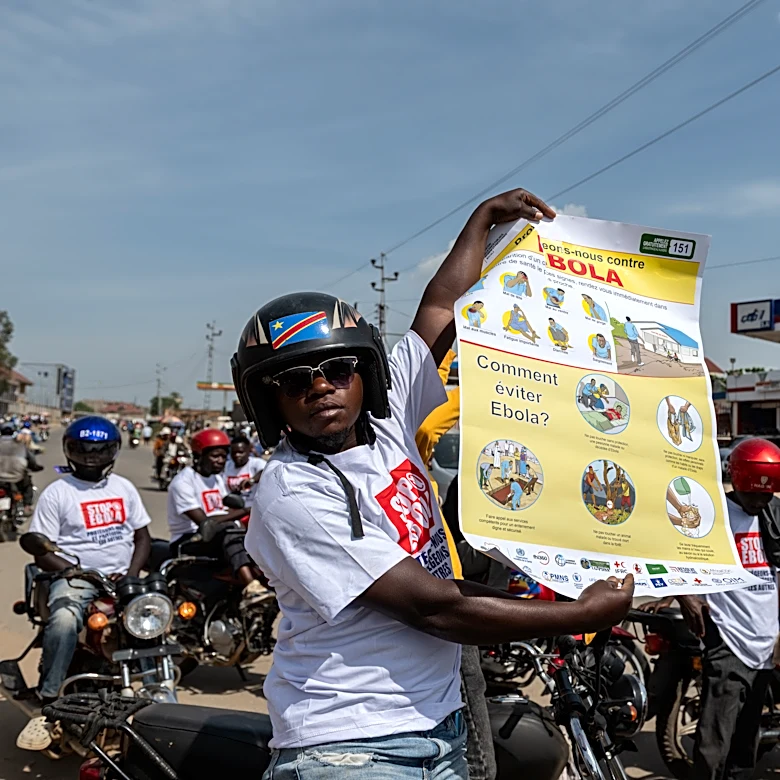 Motorcycle taxi drivers in Congo rally for Ebola awareness as attacks hinder response