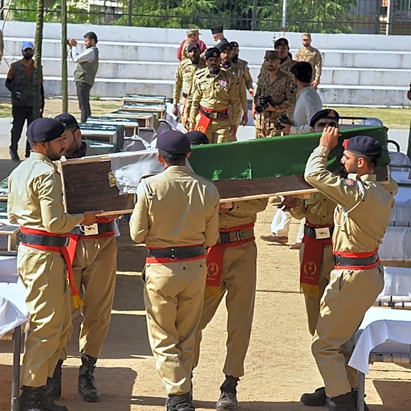 A mass funeral is held for 22 Pakistani soldiers who died in a helicopter crash in Kashmir