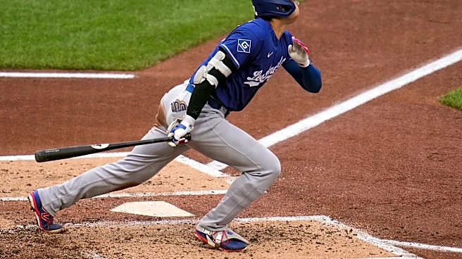 Ohtani homers, leaves game with left knee inflammation in Dodgers' 8-6 win over Pirates