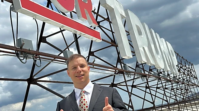 Can the man behind a giant pro-Trump sign ride the president’s praise to Congress?