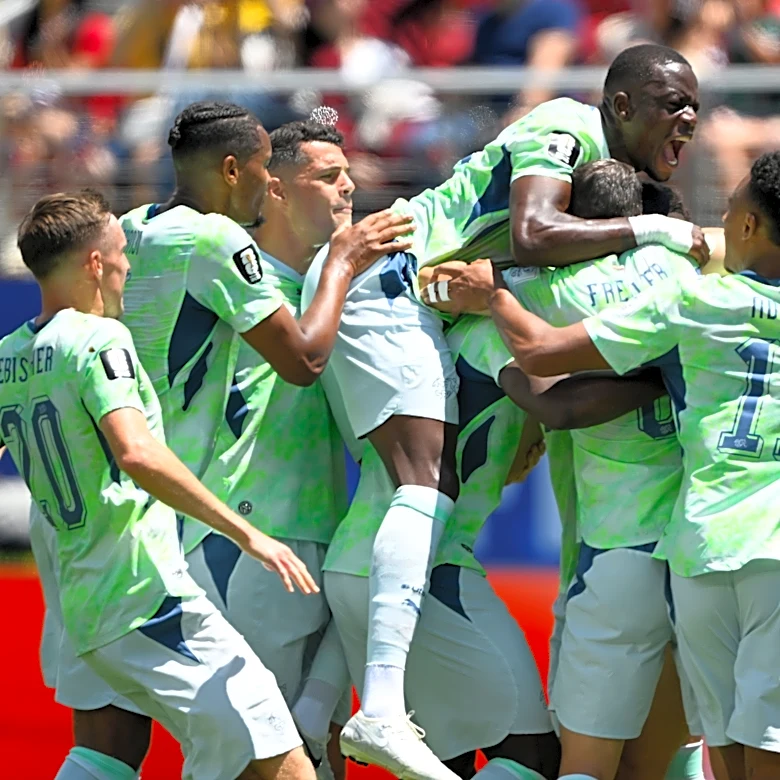 Boualem Khoukhi's goal on header in stoppage time earns Qatar a 1-1 World Cup draw with Switzerland